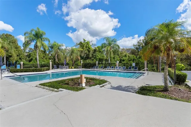 a view of swimming pool with a yard