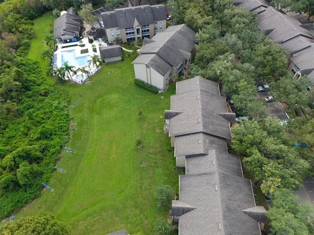aerial view of a house with garden
