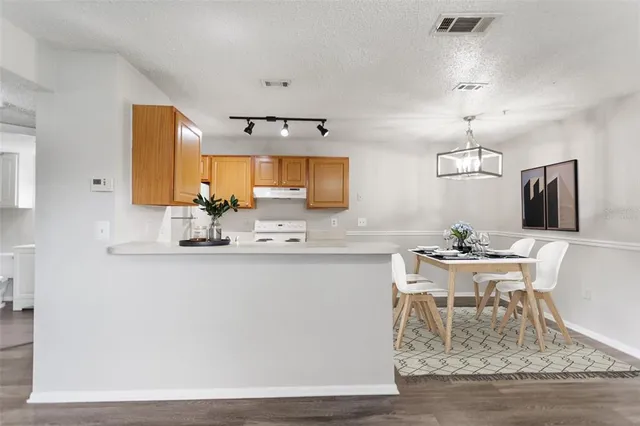 a view of kitchen with breakfast area