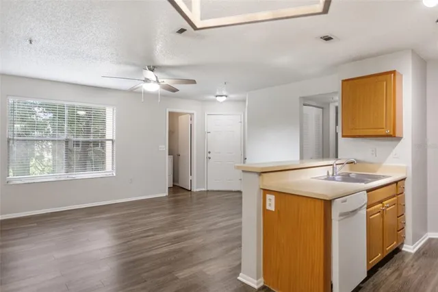 a bathroom with a sink a vanity and a mirror