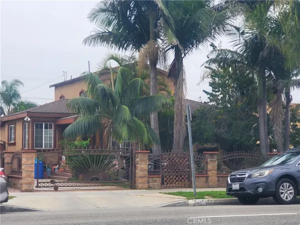 a view of a car parked in front of a house