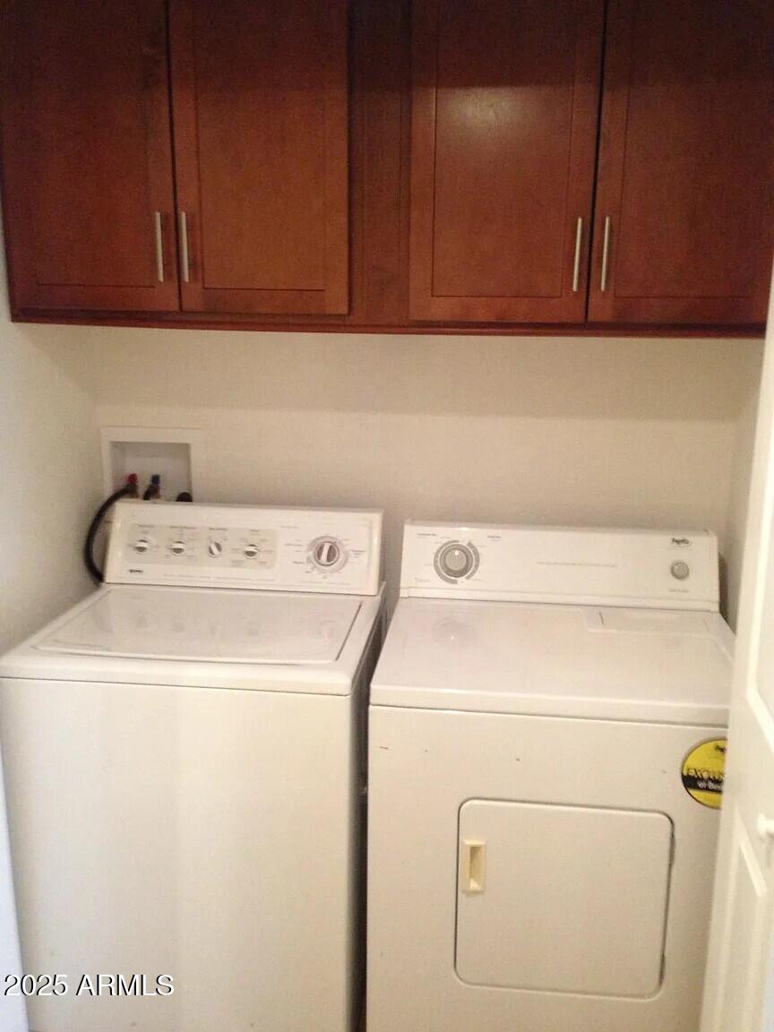 4540 North 44th Street, Unit 47 Phoenix, AZ 85018 - Photo 7 of 16 a utility room with dryer and washer