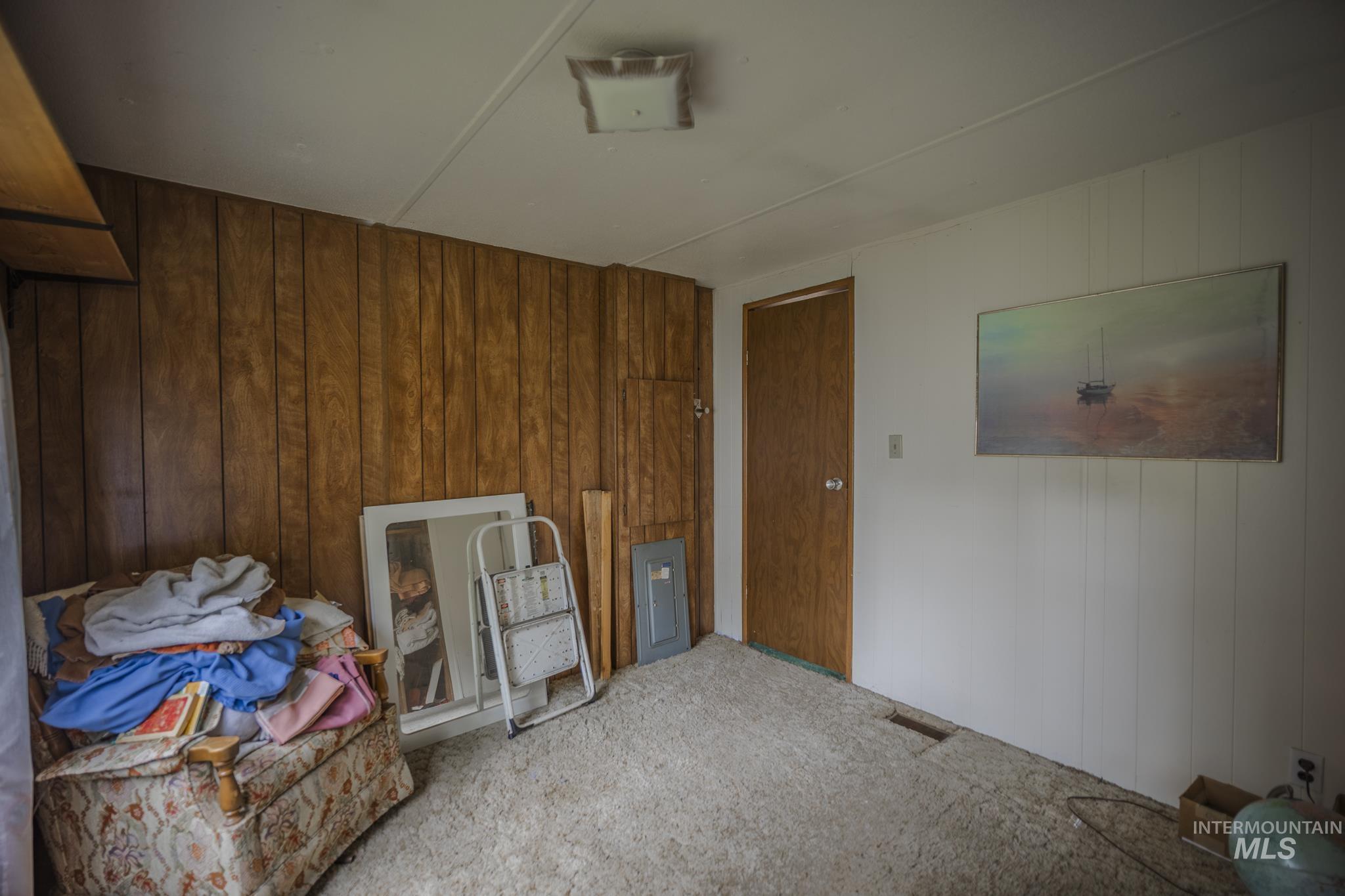 140 Ridgeway Drive Elk City, ID 83525 - Photo 30 of 47 Interior space with wood walls and carpet