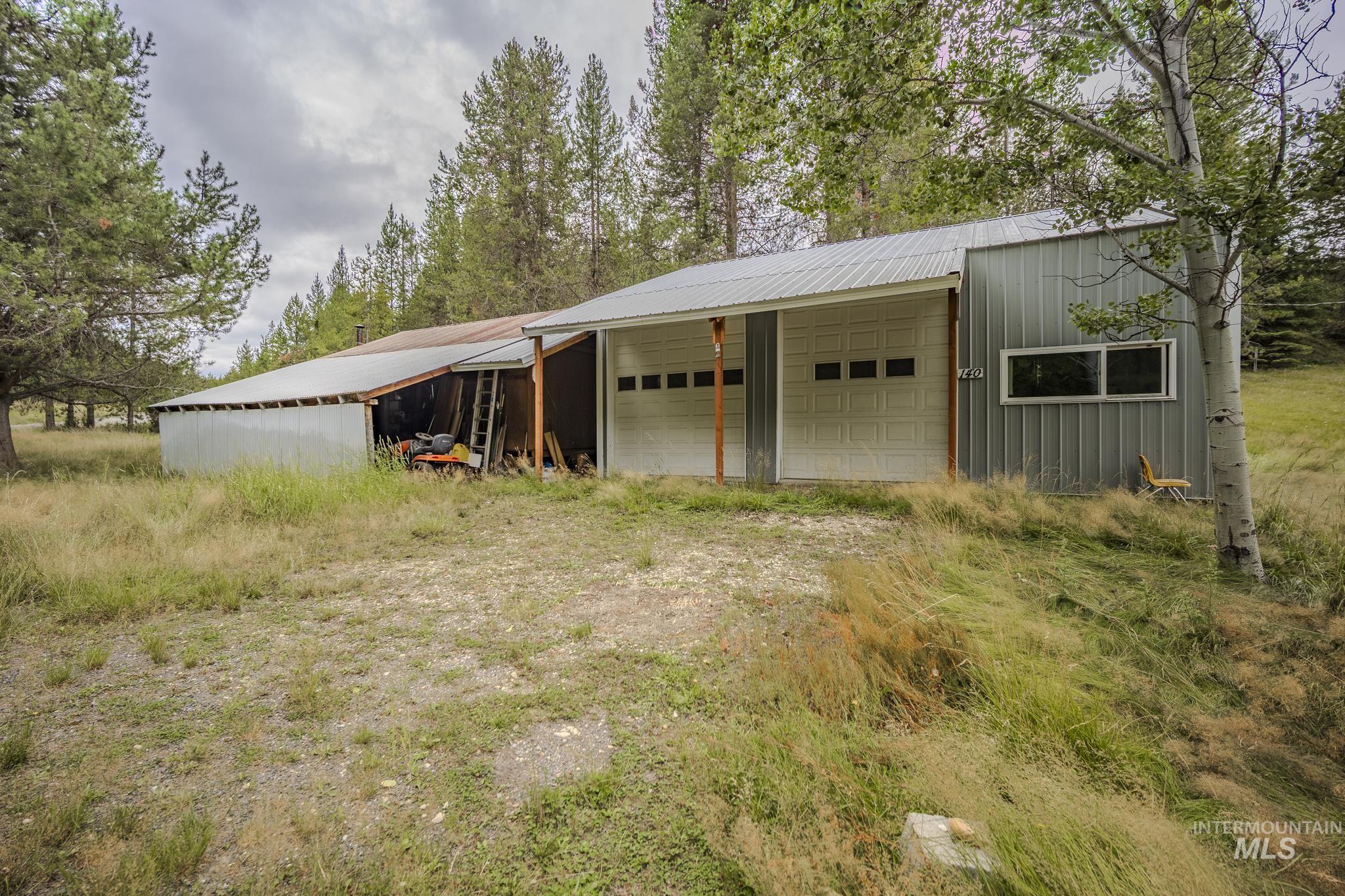 140 Ridgeway Drive Elk City, ID 83525 - Photo 32 of 47 View of pole building featuring a garage