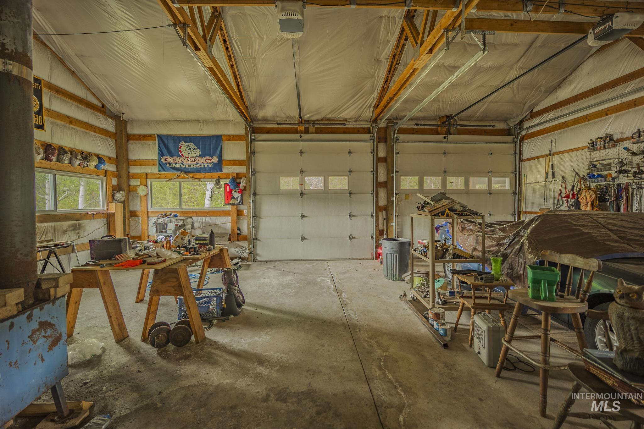 140 Ridgeway Drive Elk City, ID 83525 - Photo 37 of 47 Garage featuring a garage door opener