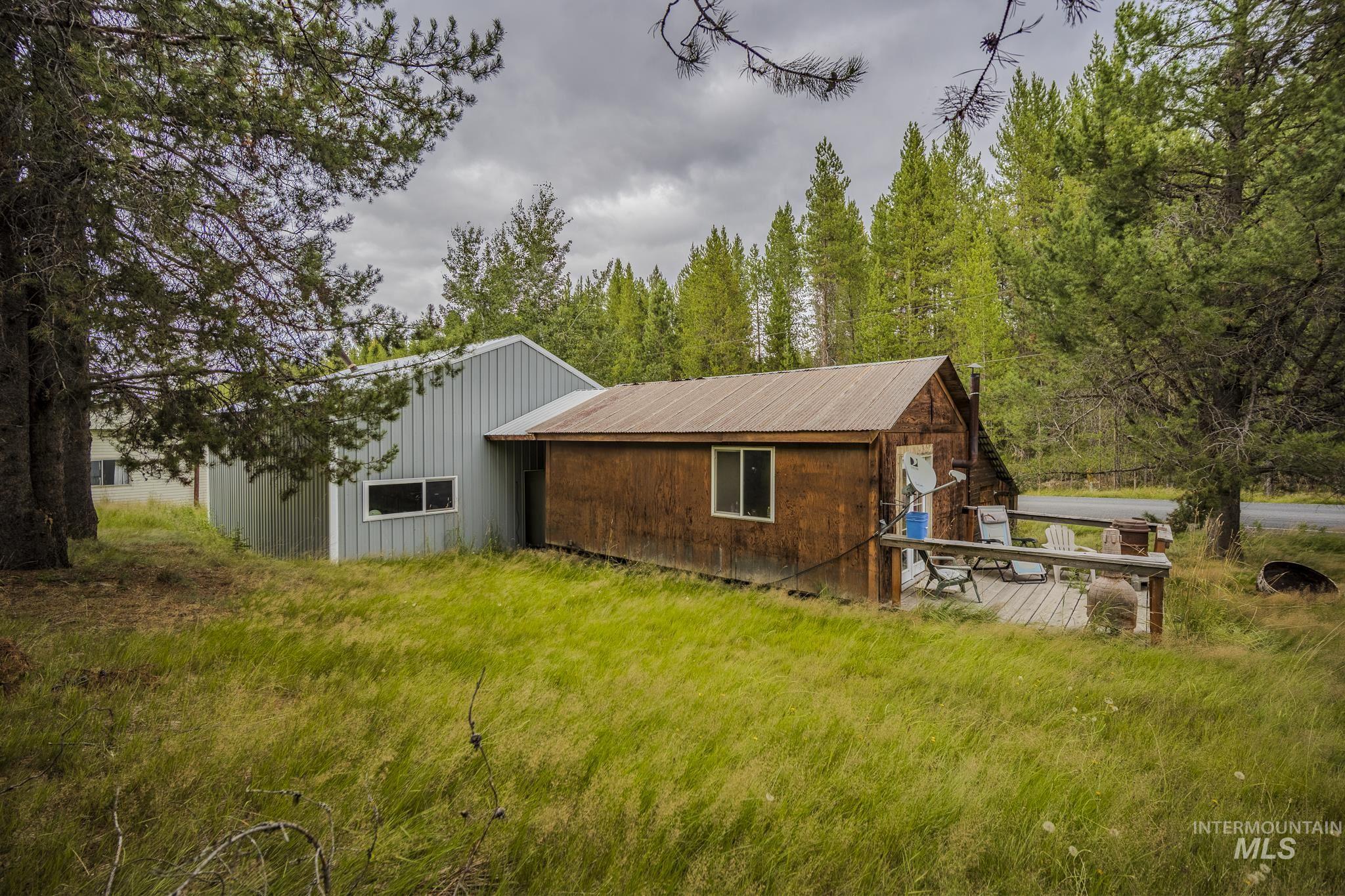140 Ridgeway Drive Elk City, ID 83525 - Photo 42 of 47 Back of property featuring a deck
