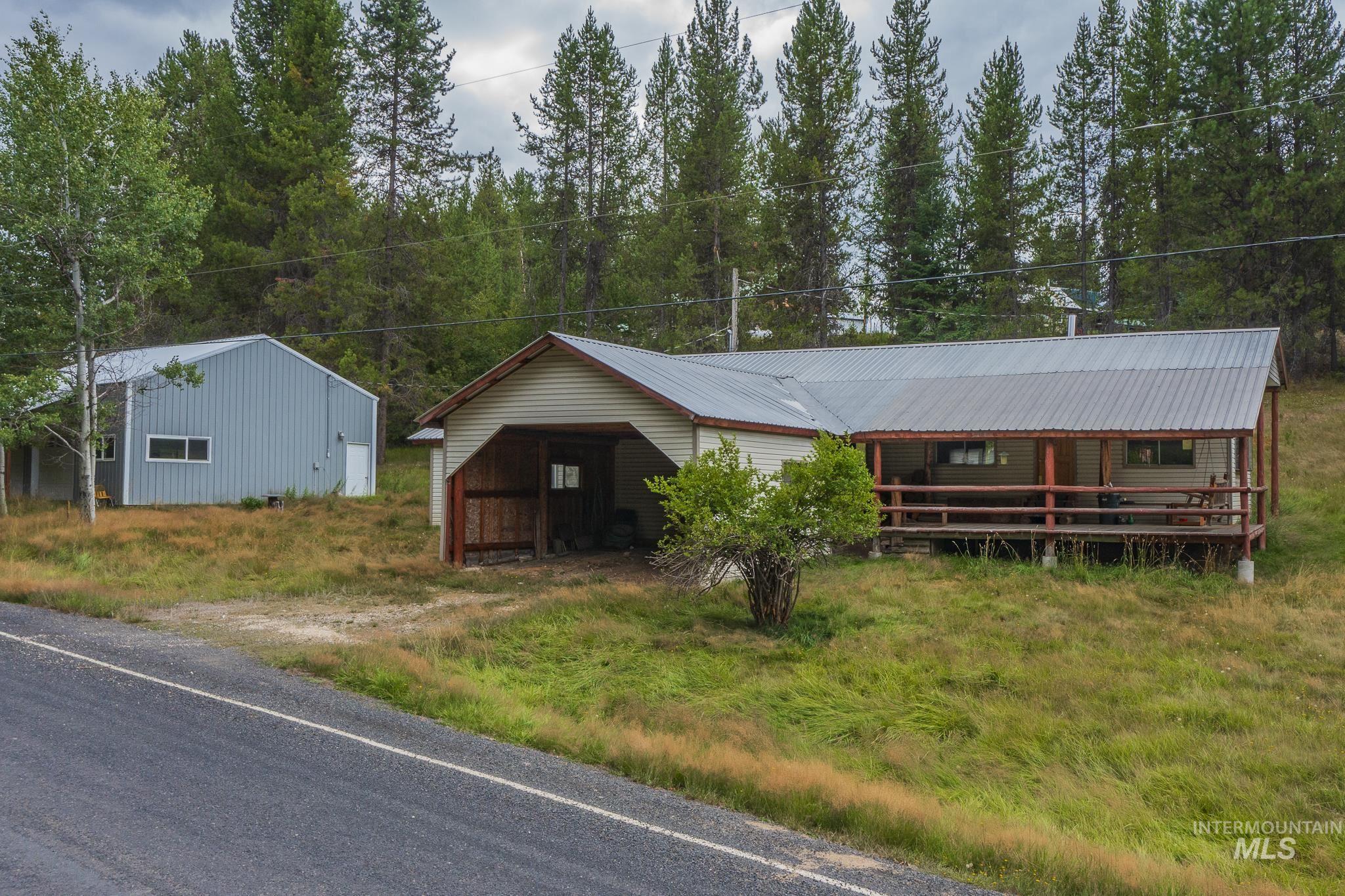 140 Ridgeway Drive Elk City, ID 83525 - Photo 8 of 47 View of front of home with a metal roof