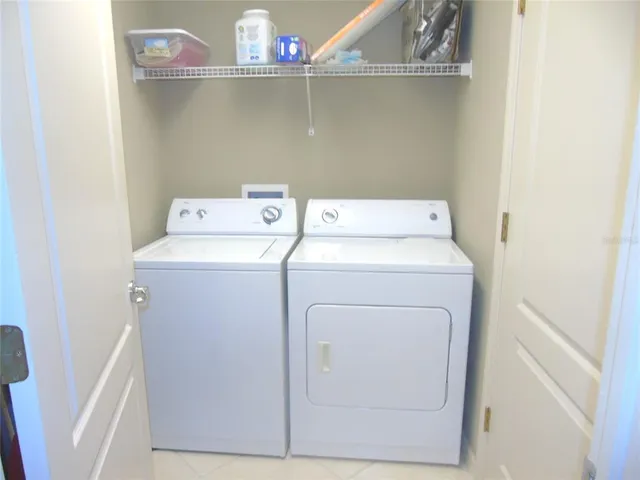 a utility room with dryer and washer