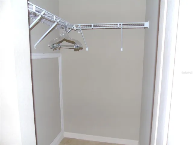 a view of a livingroom with furniture and a flat screen tv