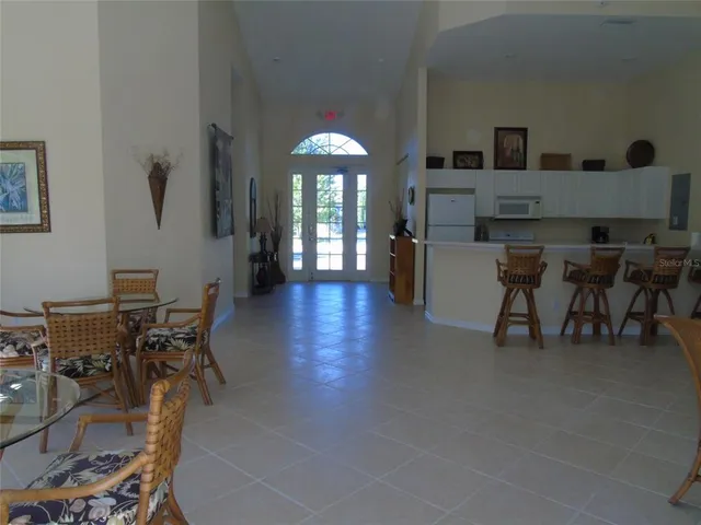 a view of a backyard with sitting area
