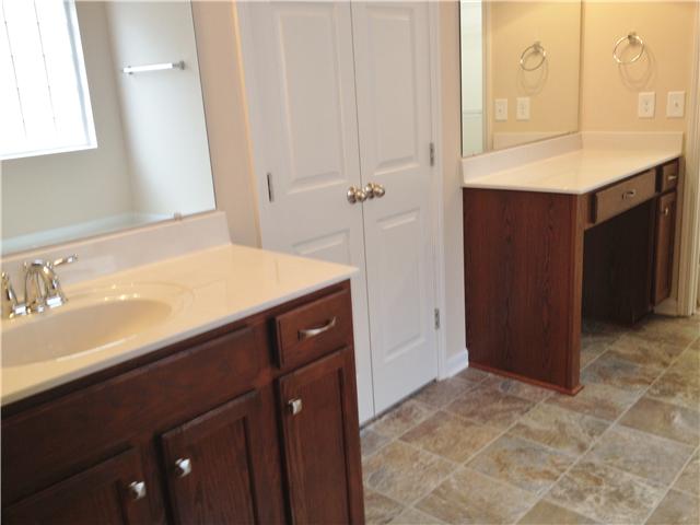 6104 Cane Springs Road Antioch, TN 37013 - Photo 3 of 8 a bathroom with a sink vanity and a mirror