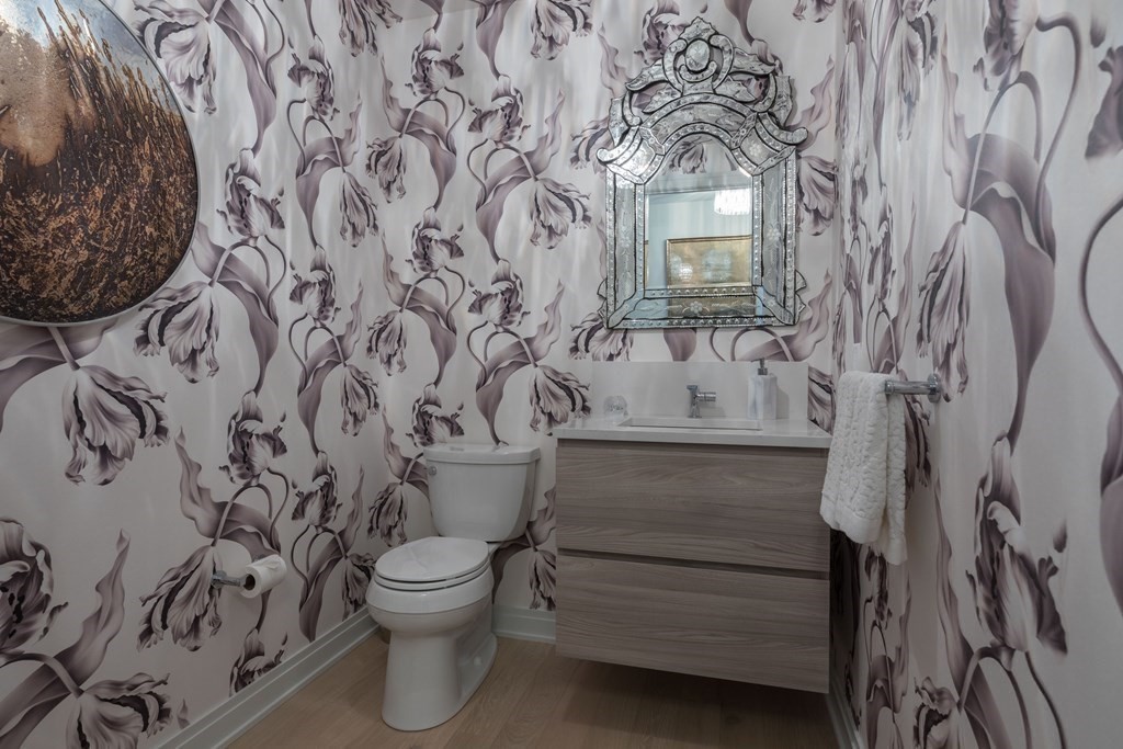 133 Seaport Boulevard, Unit 1908 Boston, MA 02210 - Photo 21 of 34 a bathroom with a toilet and a sink