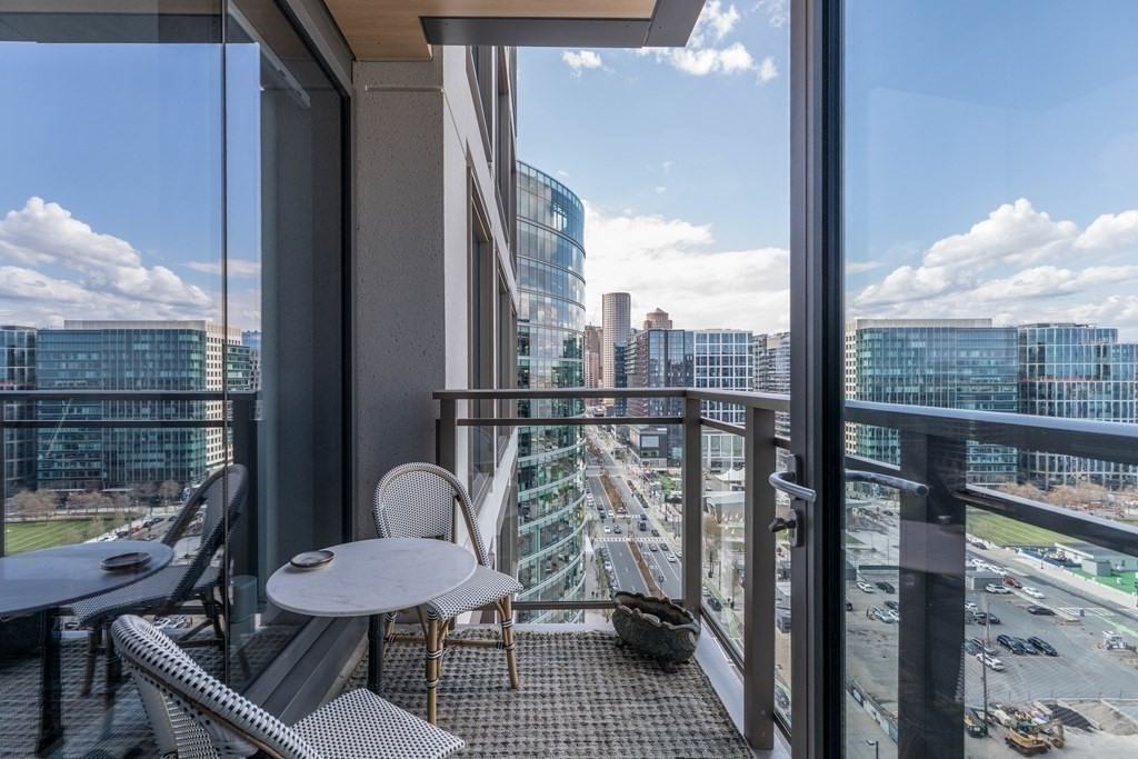 133 Seaport Boulevard, Unit 1908 Boston, MA 02210 - Photo 22 of 34 a balcony view with a seating space