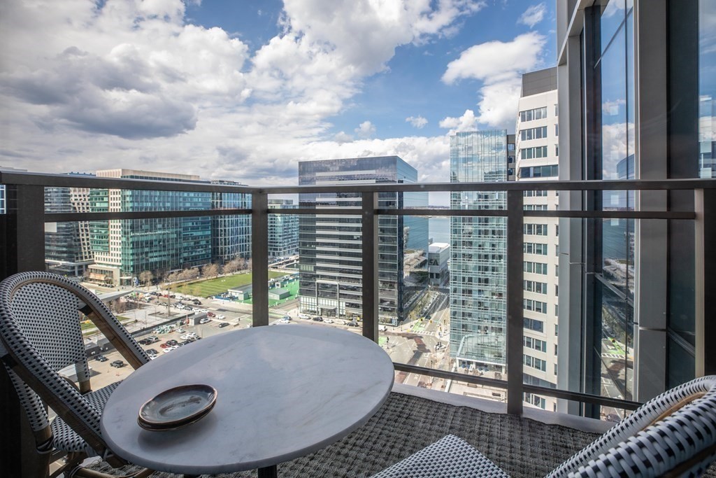 133 Seaport Boulevard, Unit 1908 Boston, MA 02210 - Photo 23 of 34 a view of a balcony and dining room