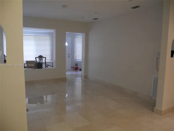 a view of a hallway with entryway