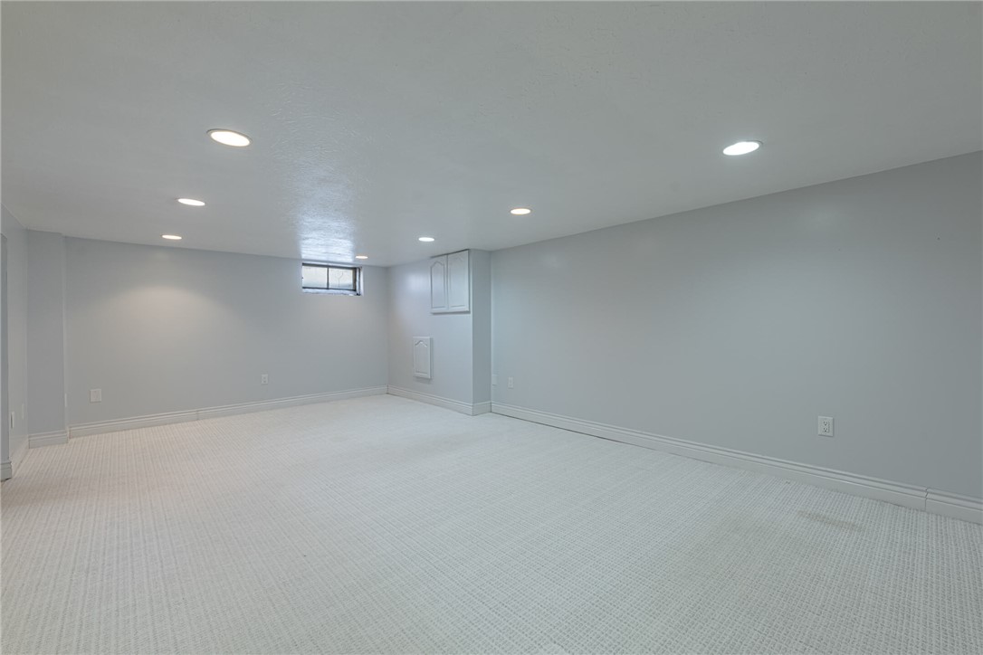 5235 West Ridgewood Road Springfield, OH 45503 - Photo 23 of 32 This spacious, finished basement offers ample room for recreation and relaxation.