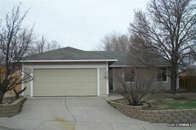 2075 Kings Row Reno, NV 89503 - Photo 1 of 1 a front view of a house with garden