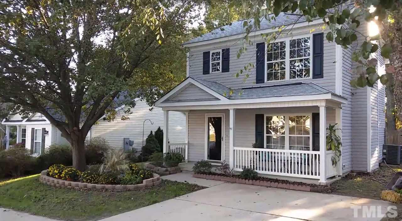 5619 Marthonna Way Raleigh, NC 27616 - Photo 1 of 26 a front view of a house with a garden