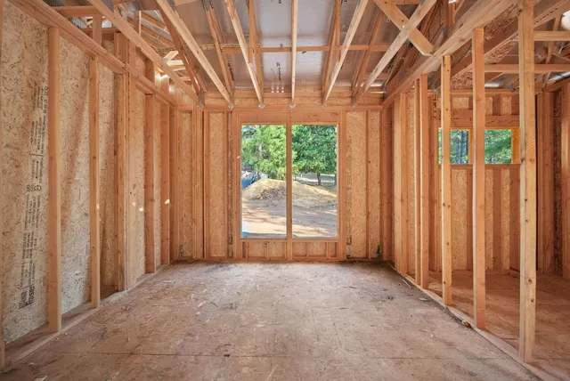 a view of a room with next to a window