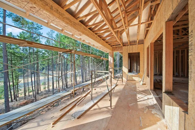 a view of a patio with a backyard