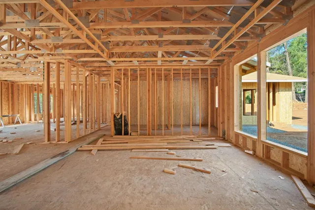 a view of a room with a large window
