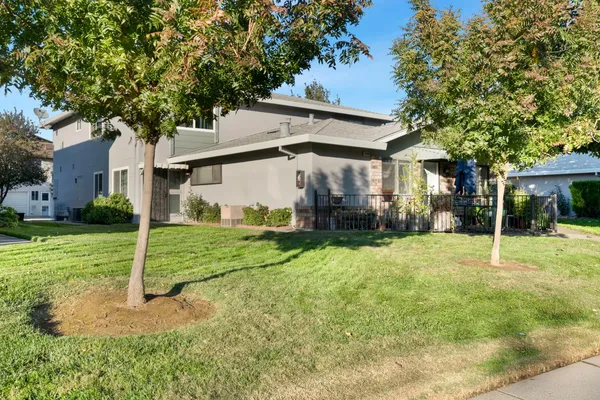 front view of a house with a yard
