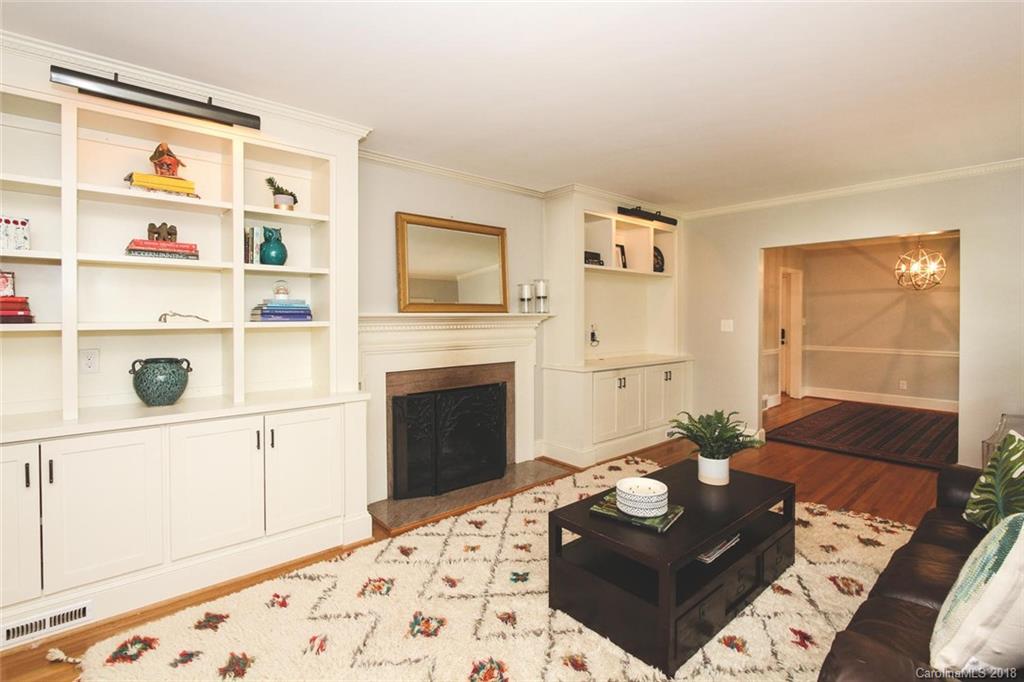 527 Ashworth Road Charlotte, NC 28211 - Photo 8 of 34 a living room with furniture and a fireplace
