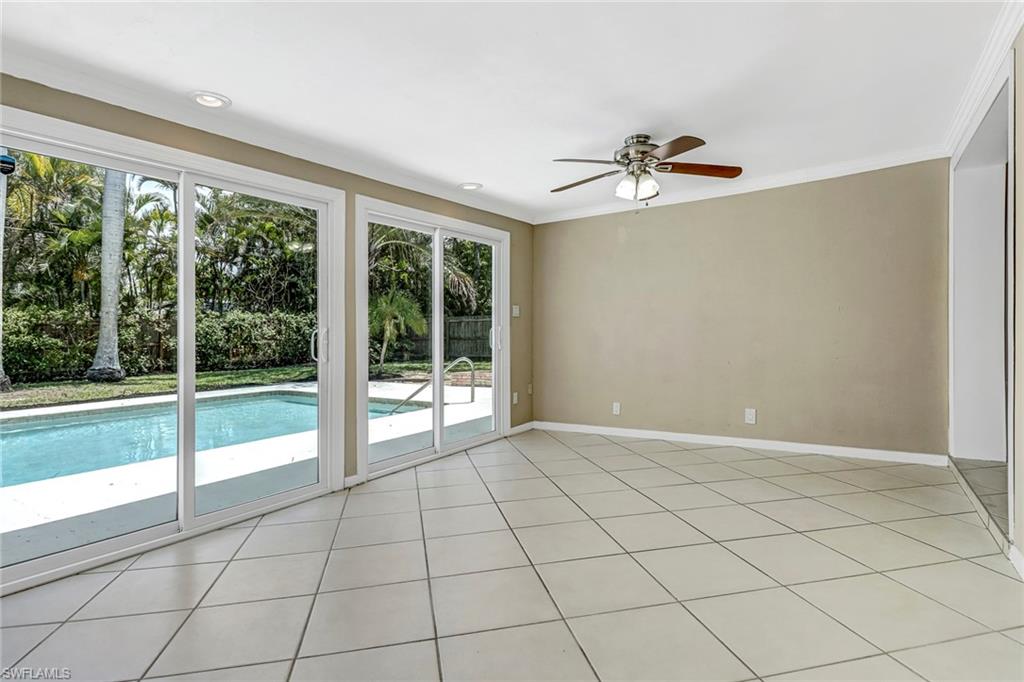189 Mentor Drive Naples, FL 34110 - Photo 15 of 25 a view of an empty room with a window