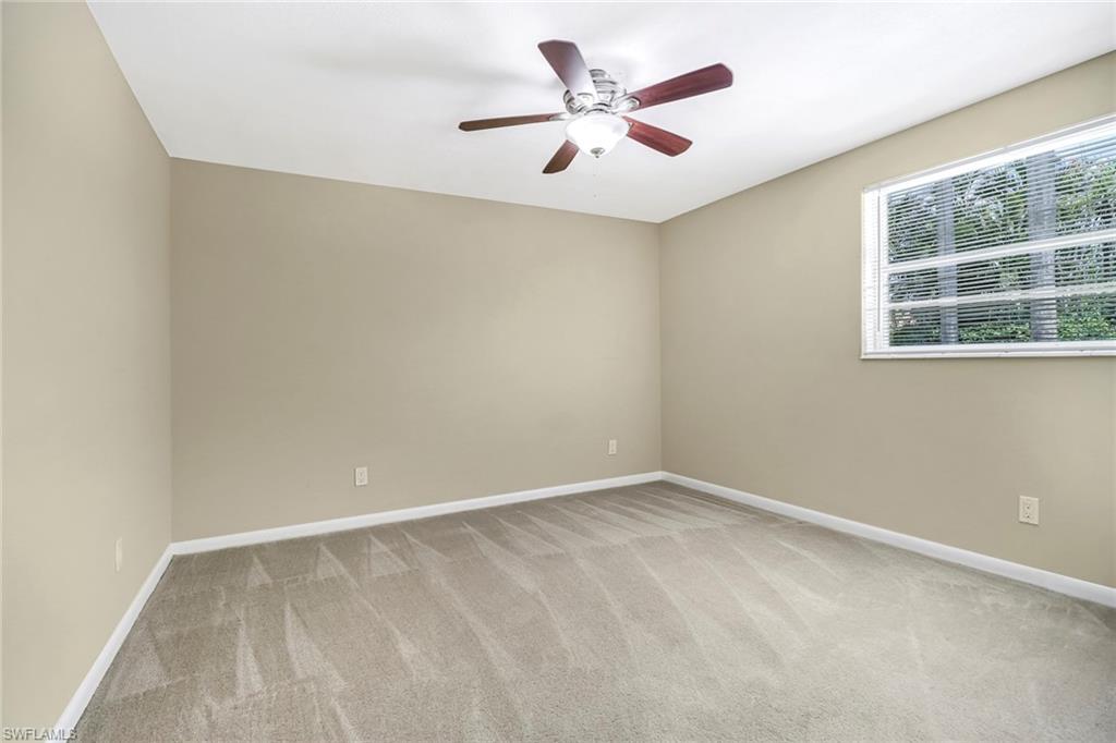 189 Mentor Drive Naples, FL 34110 - Photo 19 of 25 an empty room with a window