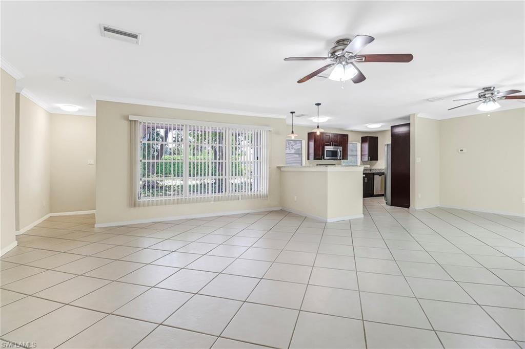 189 Mentor Drive Naples, FL 34110 - Photo 5 of 25 a view of a electric appliances in a room