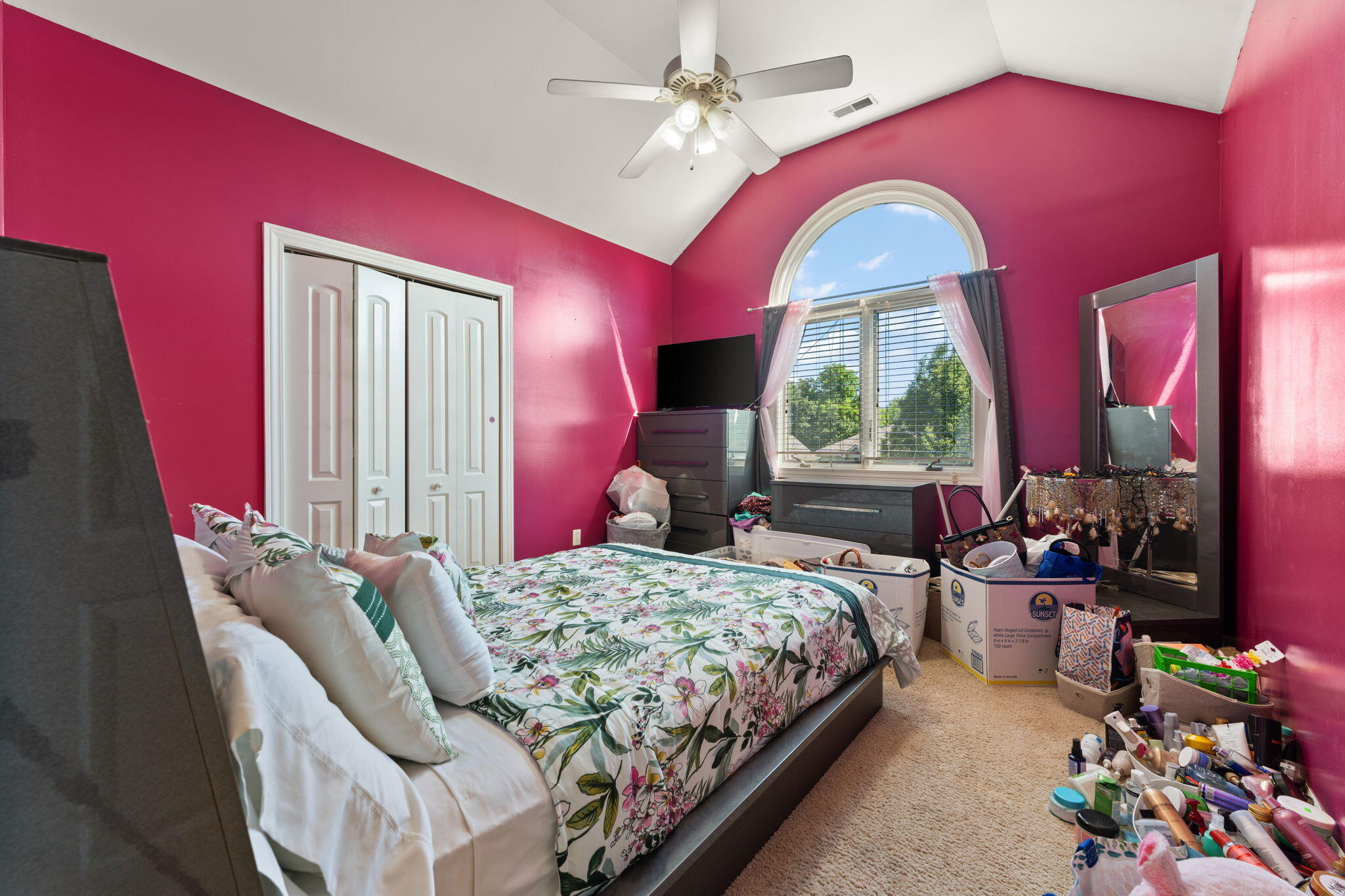 5371 72nd Avenue Schererville, IN 46375 - Photo 20 of 28 a bedroom with a bed and a chandelier