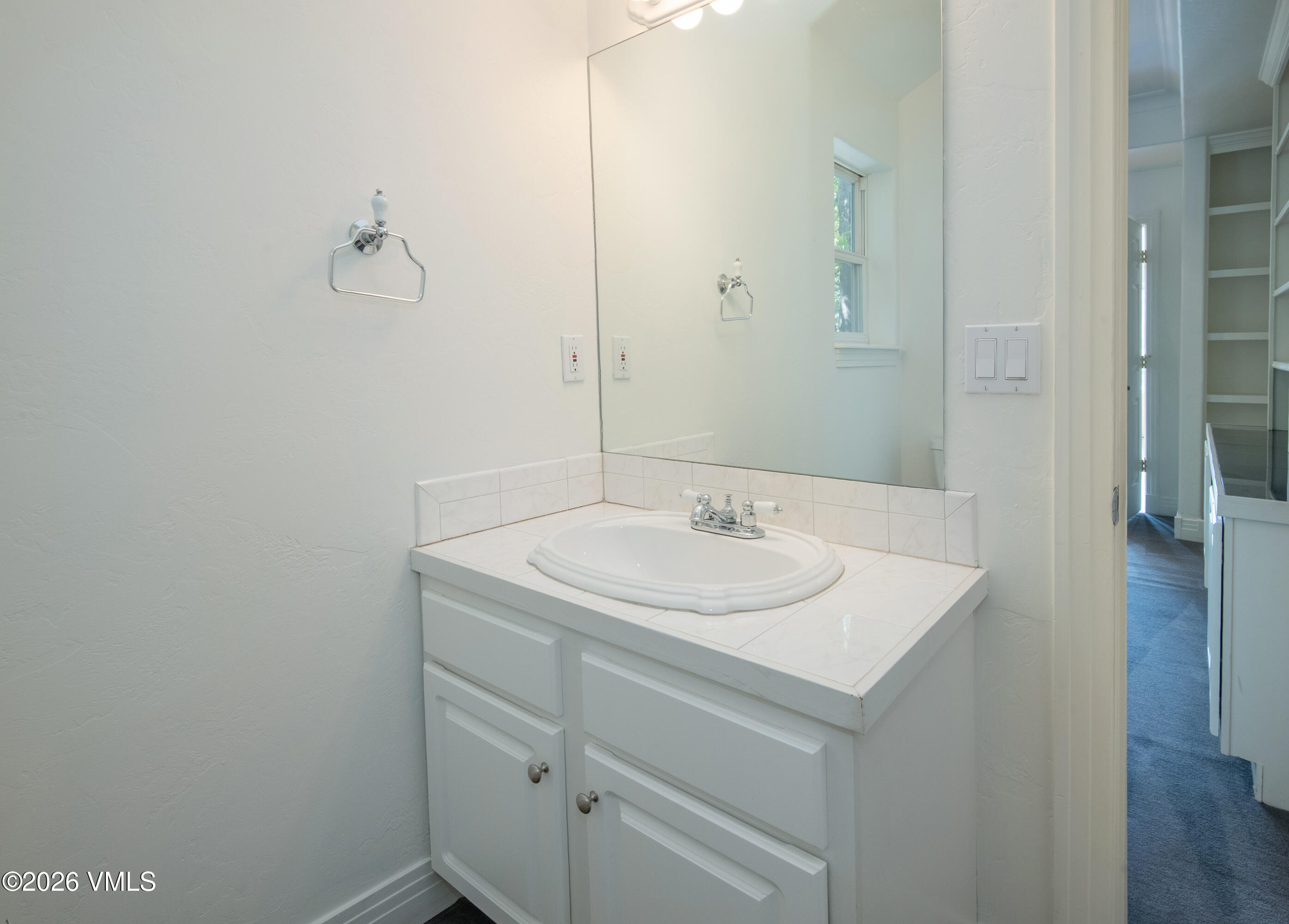 471 Rawhide Road Edwards, CO 81632 - Photo 26 of 51 a bathroom with a sink and a mirror