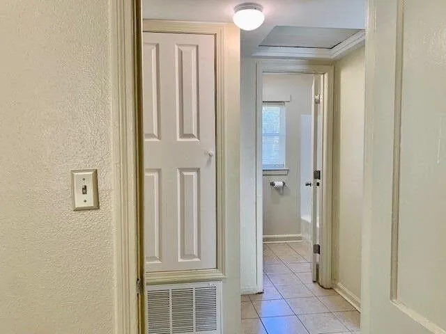 a view of a bathroom with a sink and a mirror