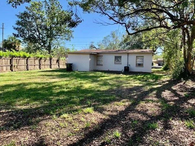 a house view with a garden space