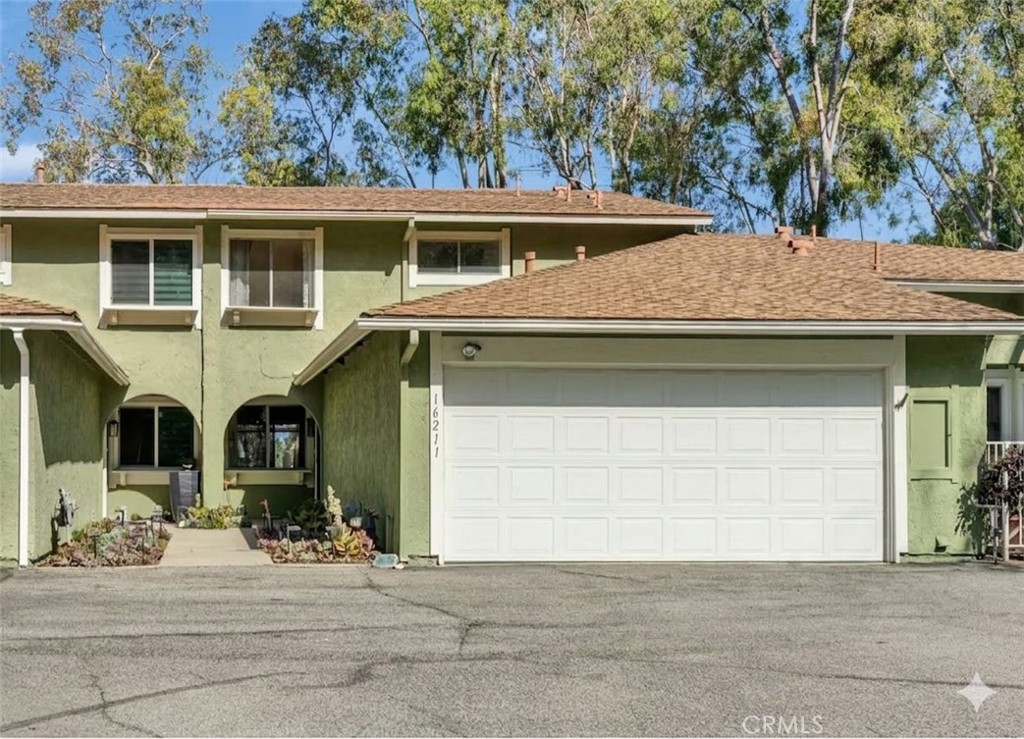 16211 Sierra Ridge Way Hacienda Heights, CA 91745 - Photo 1 of 46 a front view of a house with yard