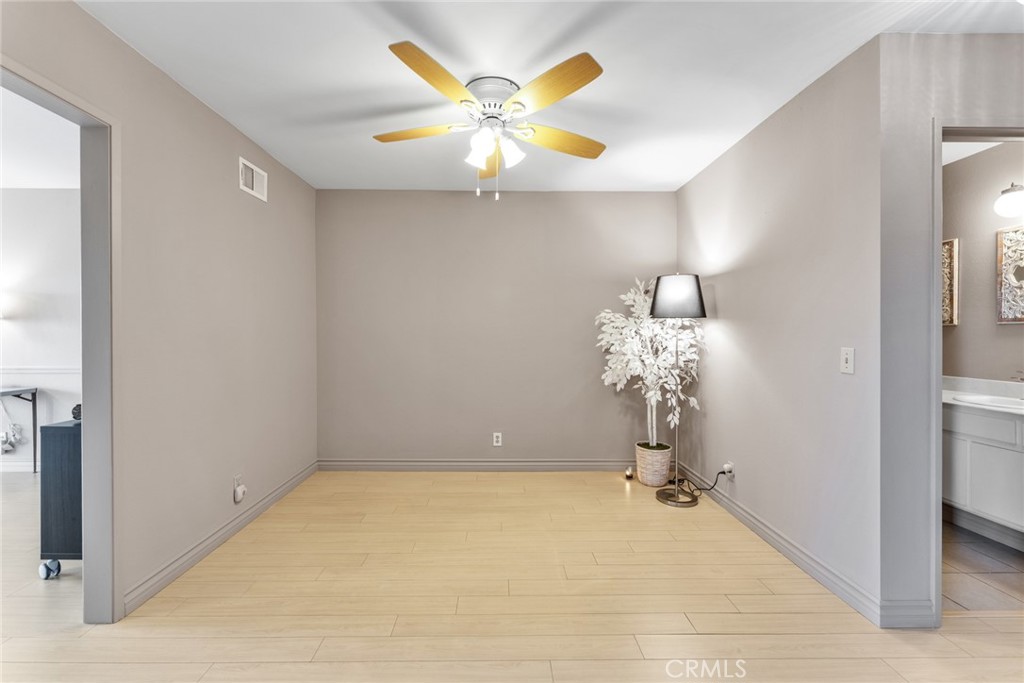 16211 Sierra Ridge Way Hacienda Heights, CA 91745 - Photo 18 of 46 a view of a chandelier fan and a chandelier fan in a room