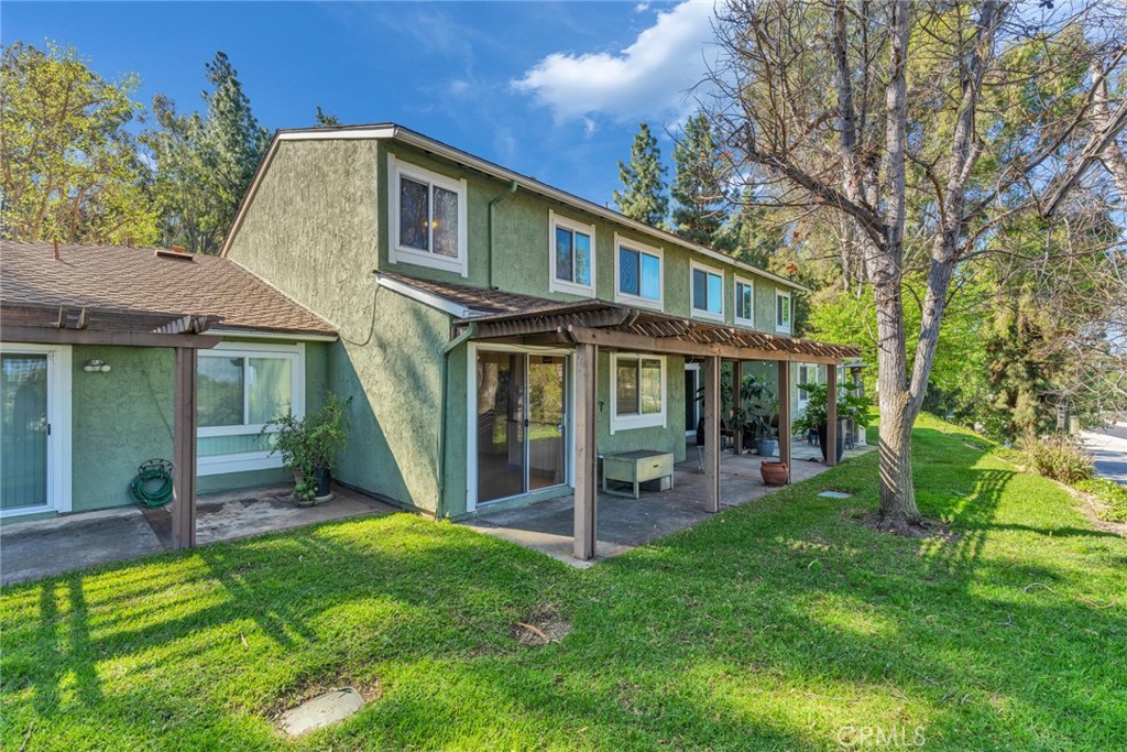 16211 Sierra Ridge Way Hacienda Heights, CA 91745 - Photo 31 of 46 a front view of a house with a yard