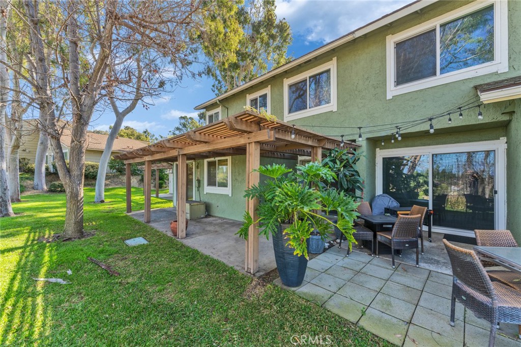 16211 Sierra Ridge Way Hacienda Heights, CA 91745 - Photo 33 of 46 a view of a house with backyard sitting area and garden