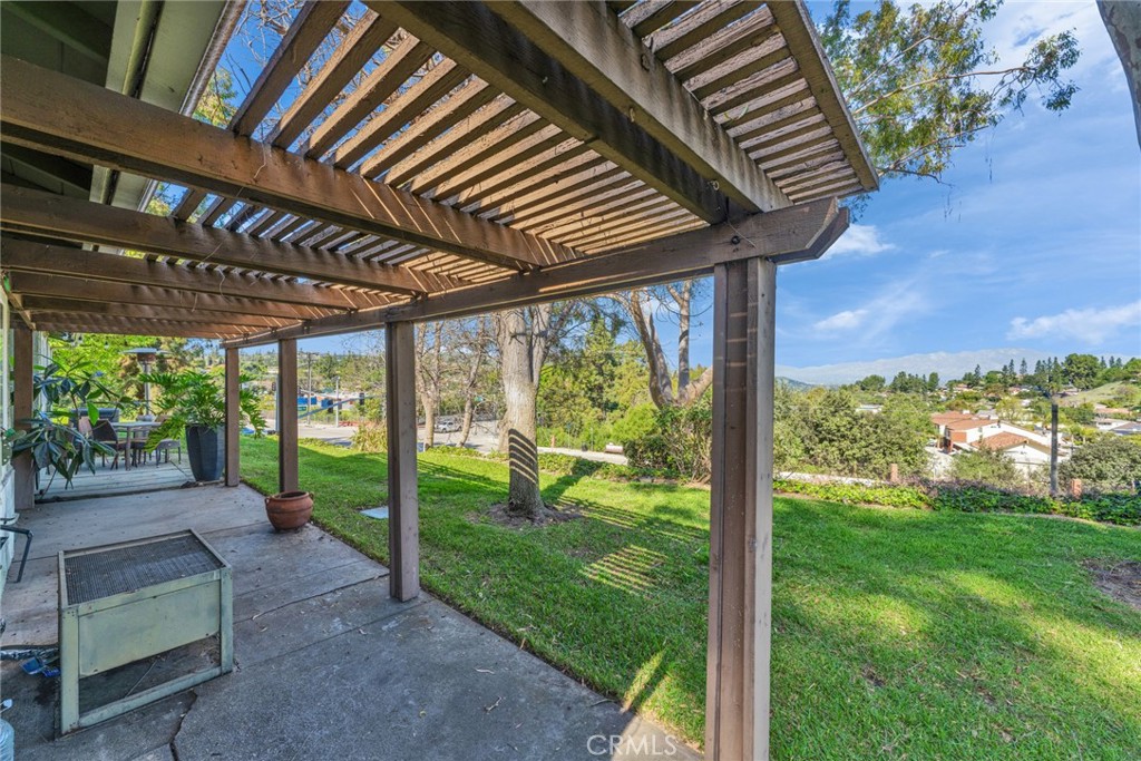 16211 Sierra Ridge Way Hacienda Heights, CA 91745 - Photo 36 of 46 a view of a porch with furniture and garden