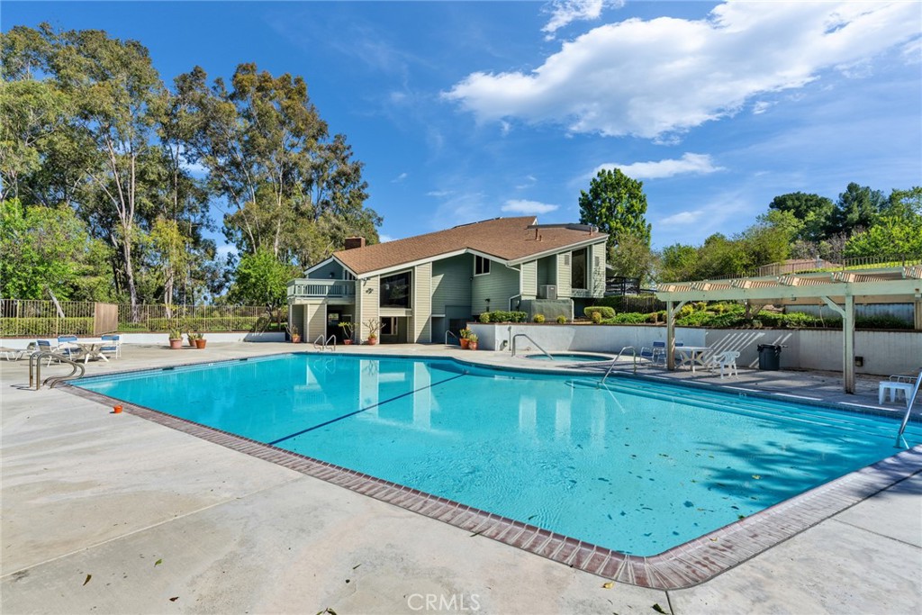16211 Sierra Ridge Way Hacienda Heights, CA 91745 - Photo 7 of 46 a view of a swimming pool with a patio