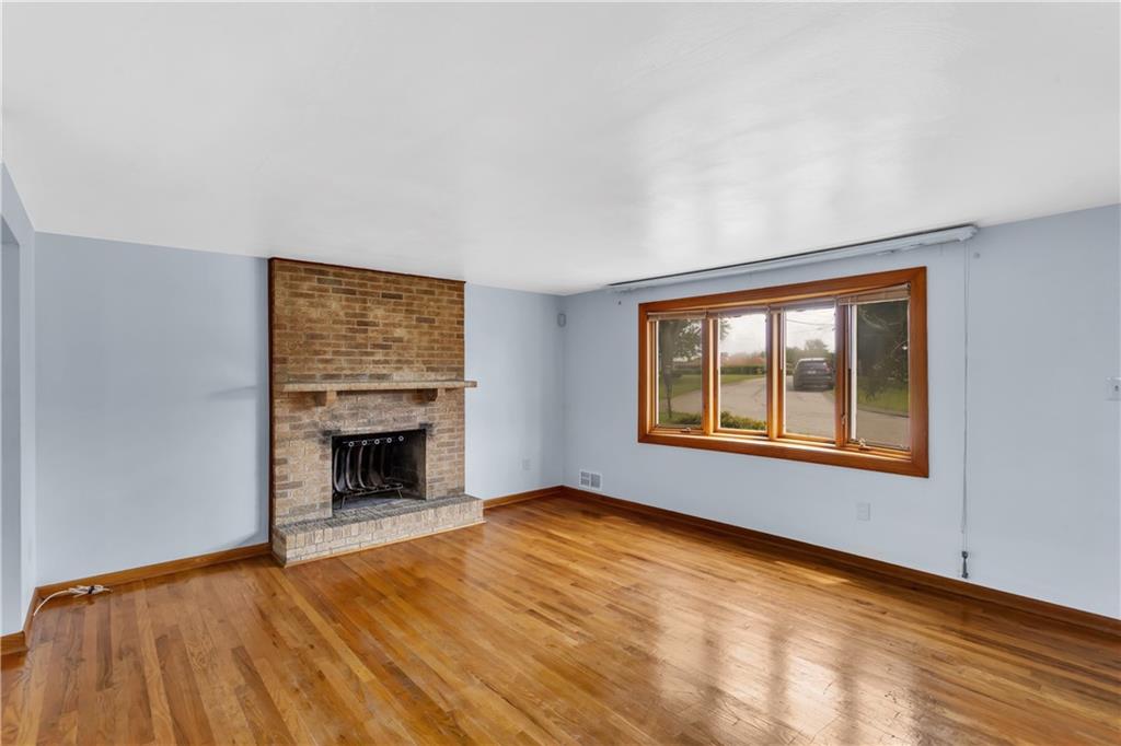 51 Revo Road Pittsburgh, PA 15236 - Photo 3 of 38 Warm original hardwood floors greet you the moment you step inside.