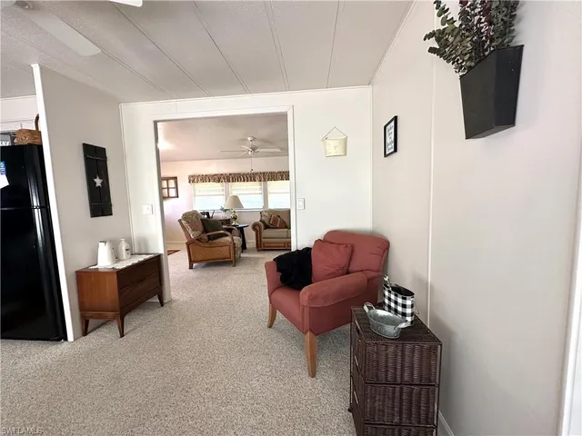 a living room with furniture or couch and a window