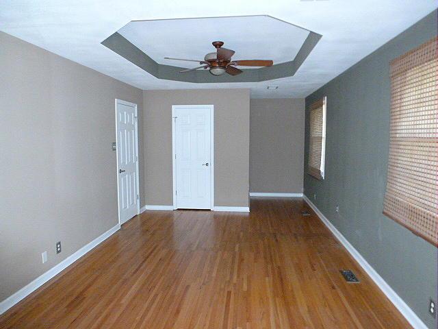 965 Gratton Road Clarksville, TN 37043 - Photo 13 of 21 BIG Master Bedroom with Hardwood Flooring,Walk in Closet, Tray Ceiling, Ceiling Fan plus it's own private deck!!
