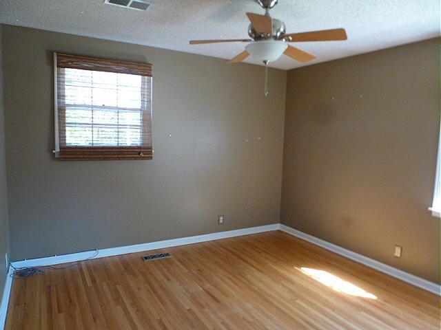 965 Gratton Road Clarksville, TN 37043 - Photo 17 of 21 Bedroom 2 on main level with Hardwood Flooring and Ceiling Fan