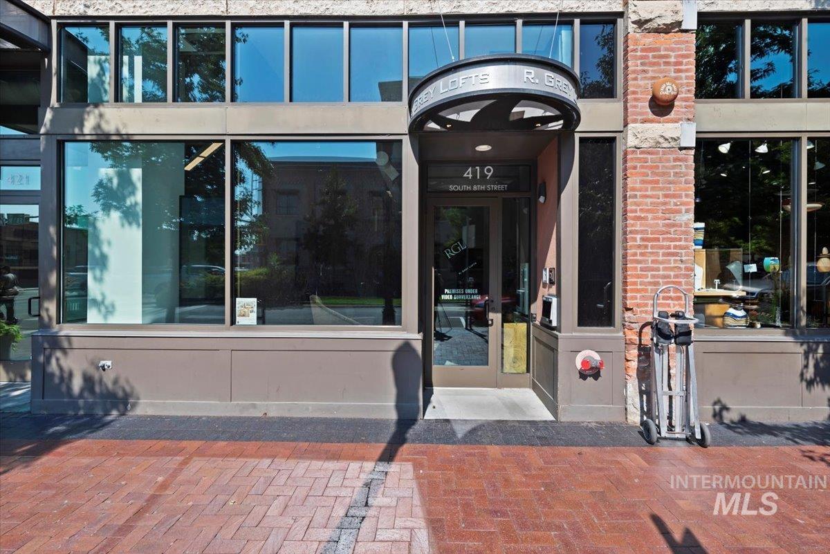 419 South 8th Street, Unit 309 Boise, ID 83702 - Photo 2 of 28 View of exterior entry featuring brick siding