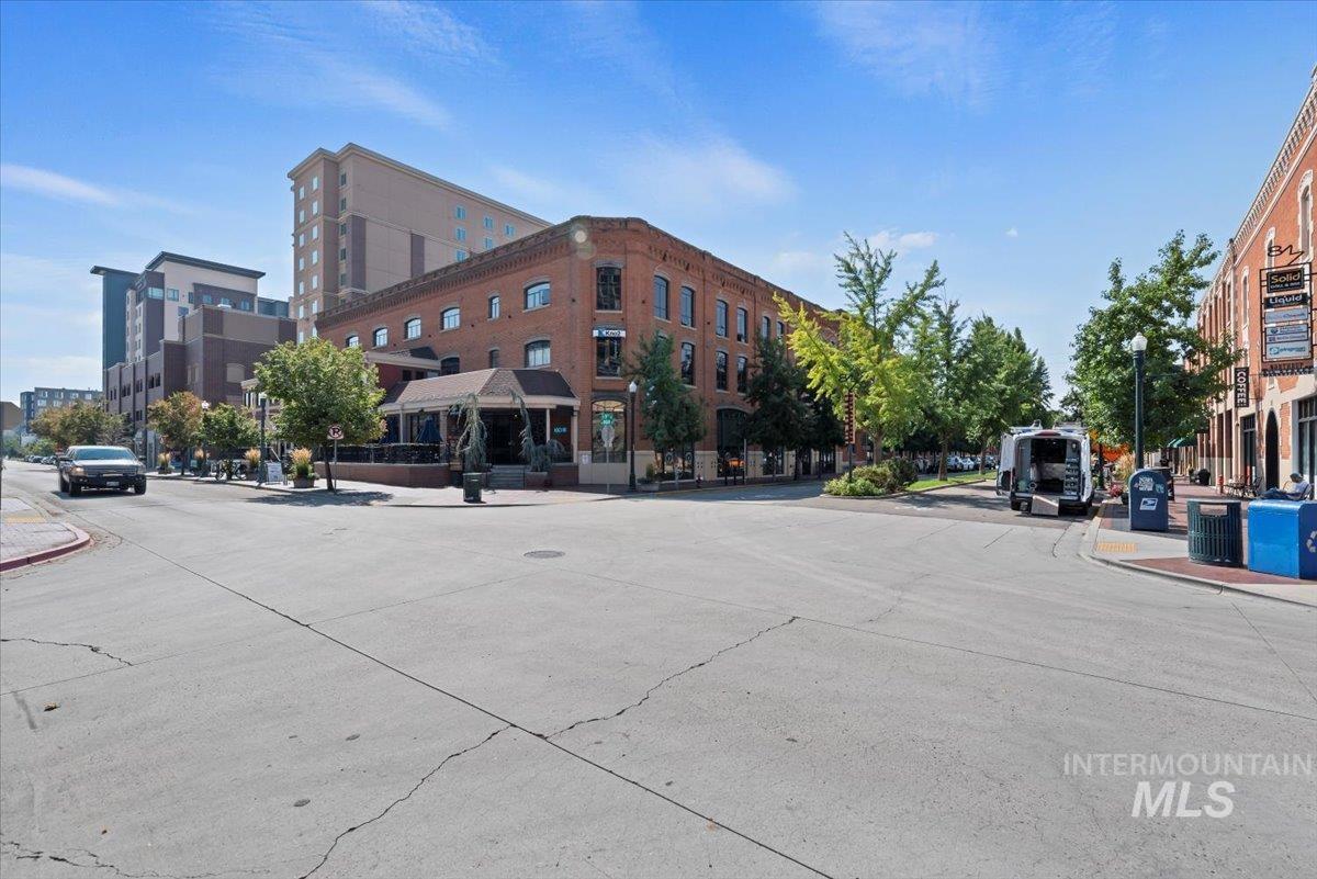 419 South 8th Street, Unit 309 Boise, ID 83702 - Photo 21 of 28 View of concrete road featuring curbs, sidewalks, and street lighting