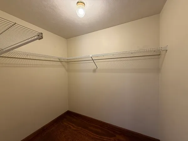 a view of a room with racks on the wall