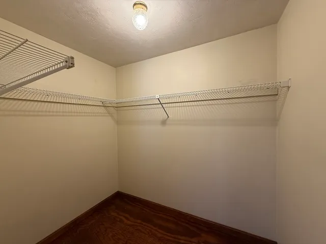a view of a room with racks on the wall