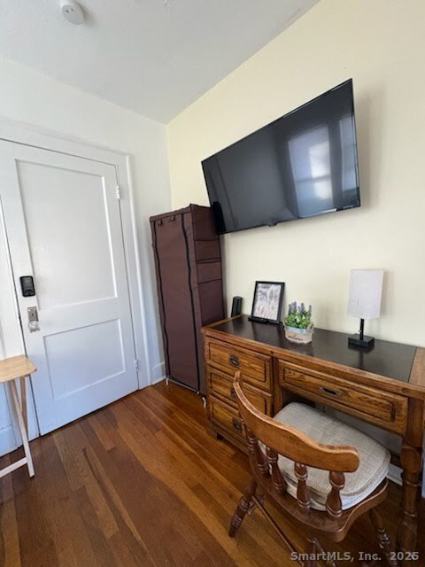68 Adelaide Avenue Waterbury, CT 06708 - Photo 4 of 5 a living room with furniture and a flat screen tv