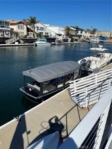 a view of a roof deck with furniture